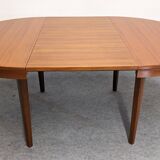 Scandinavian round extendable teak table, 60s-70s