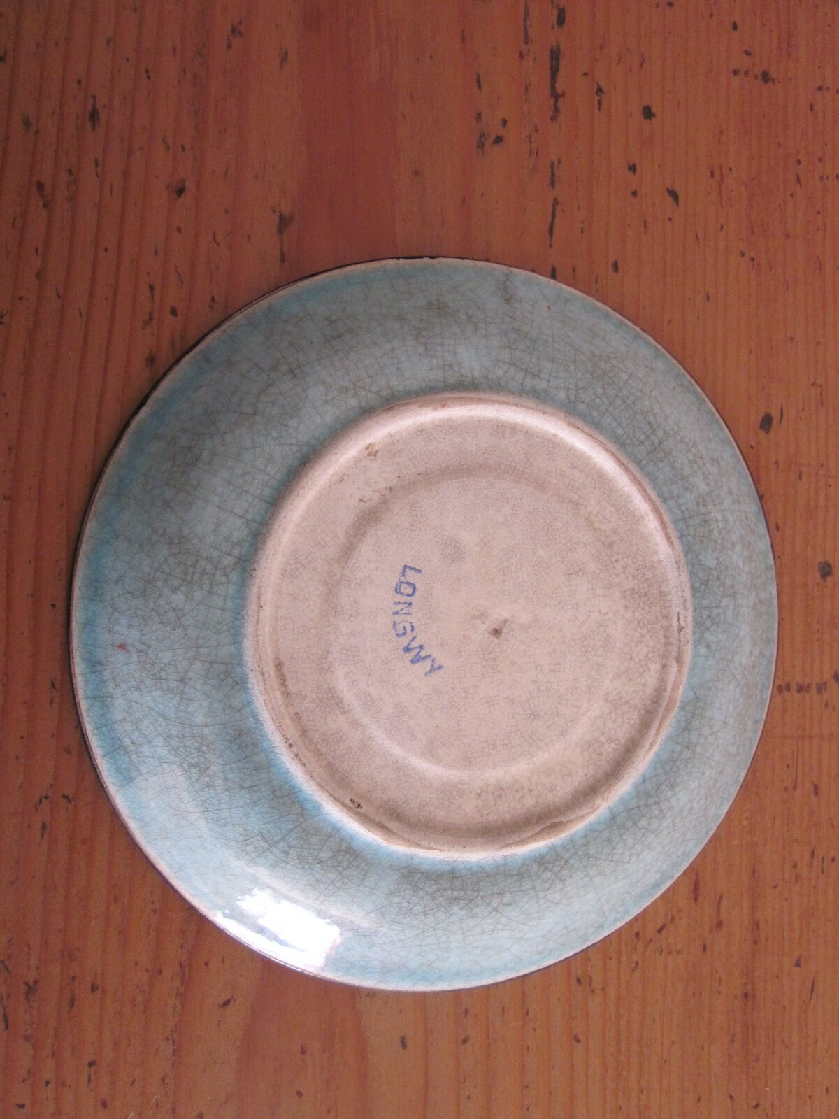 Saucer in enamels of Longwy