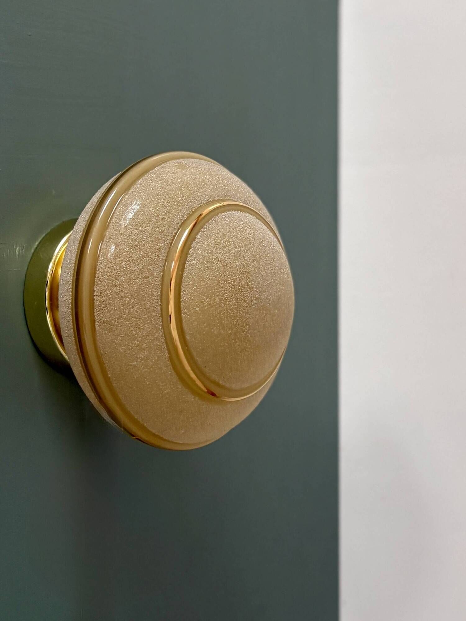 Vintage Art Deco globe wall/ceiling light in frosted yellow and gold glass.
