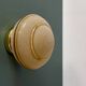 Vintage Art Deco globe wall/ceiling light in frosted yellow and gold glass.