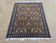 Tapis pakistanais en laine fait main - L=1m75 l=1m27..