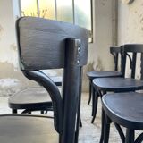 Set of 7 black bistro chairs