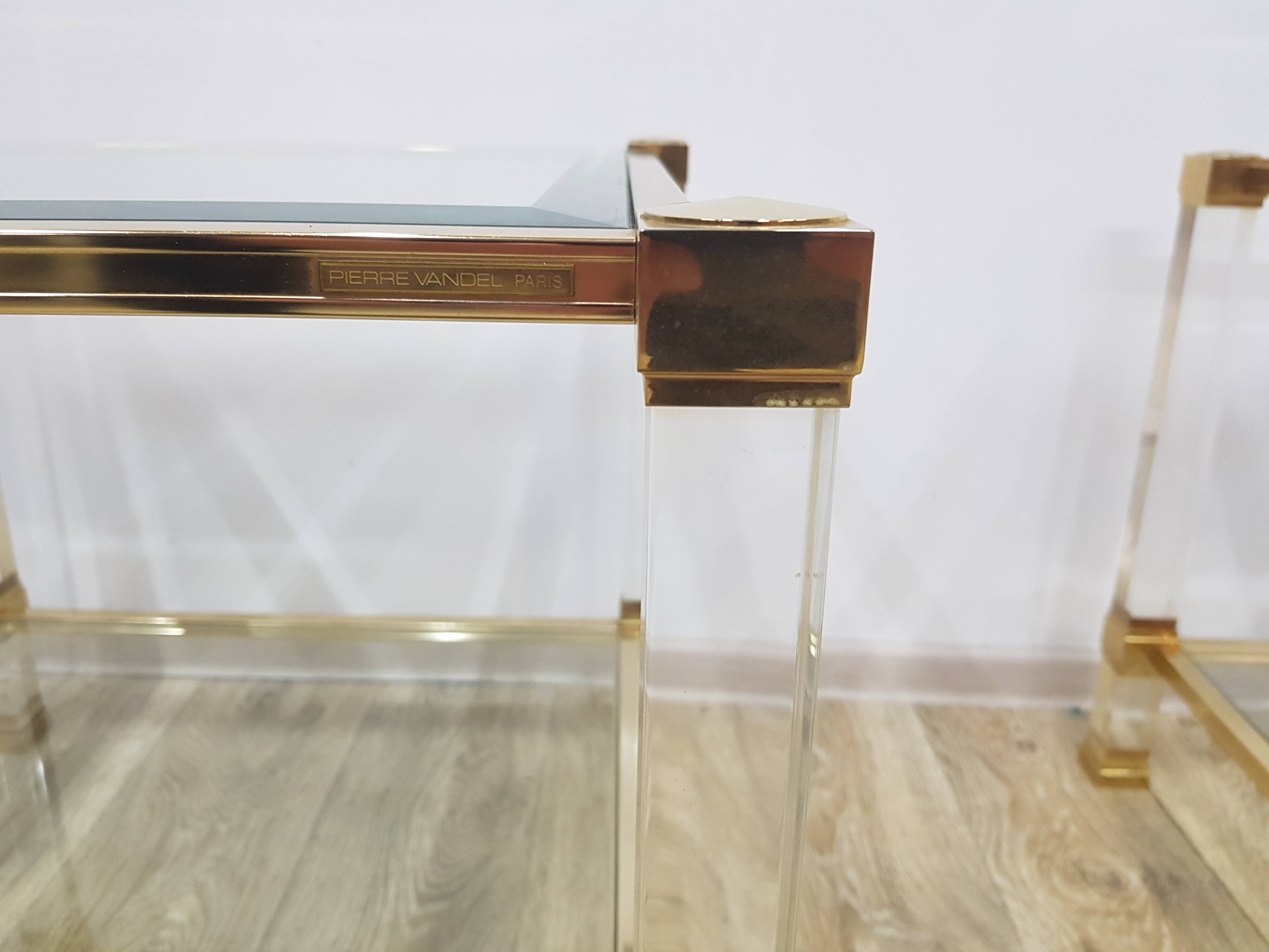 A pair of Hollywood Regency tables, designed by P. Vandel, Paris, 1970s.