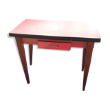 Table in red formica
