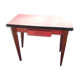 Table in red formica