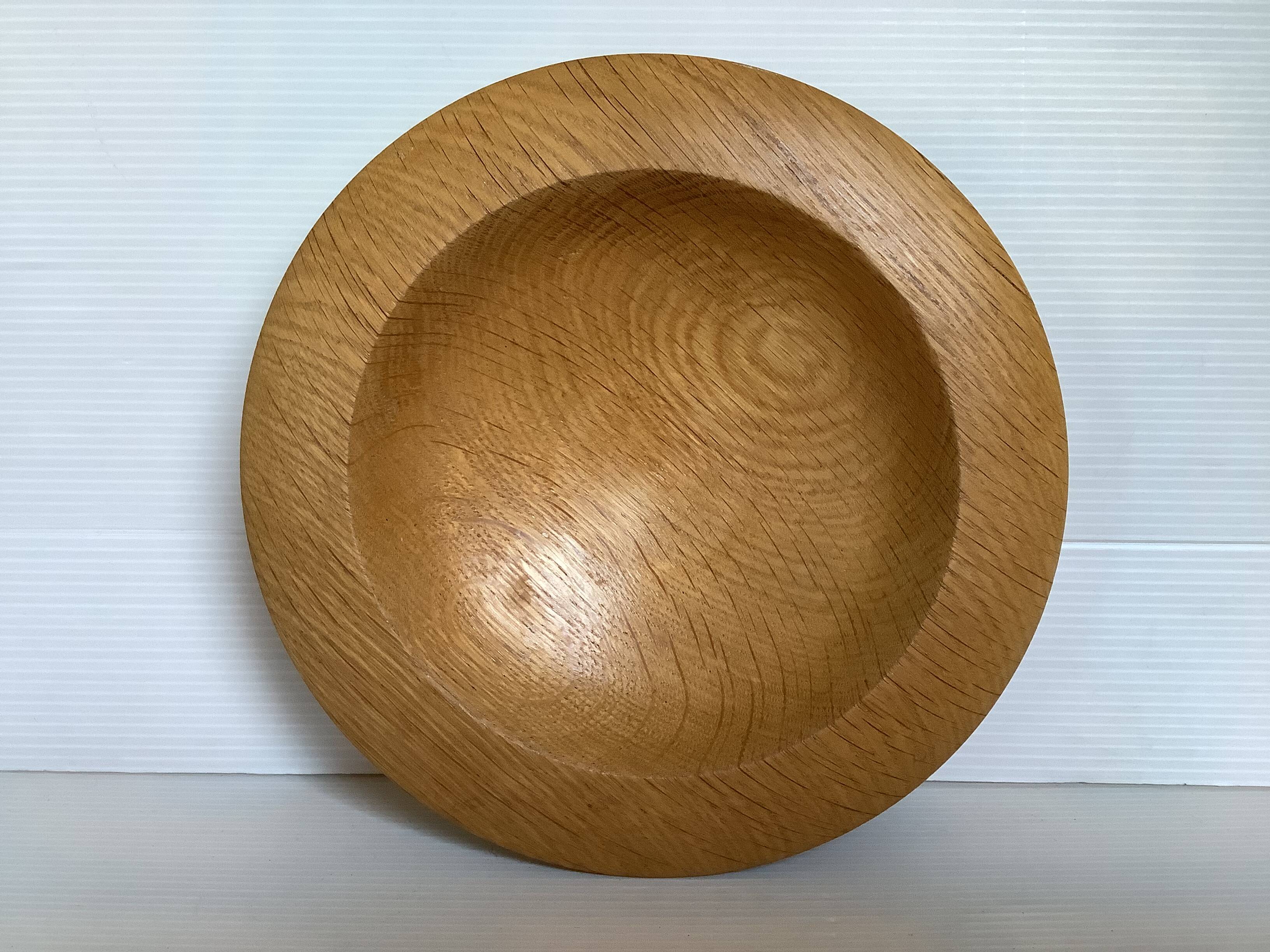 Scandinavian wooden pocket emptier