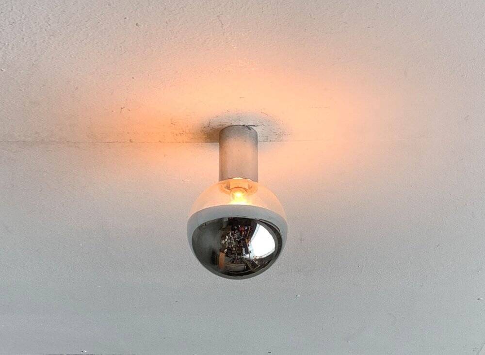 Vintage wall lamp from the German space age by Motoko Ishii for Staff, 1970s.