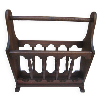 Varnished wooden magazine rack