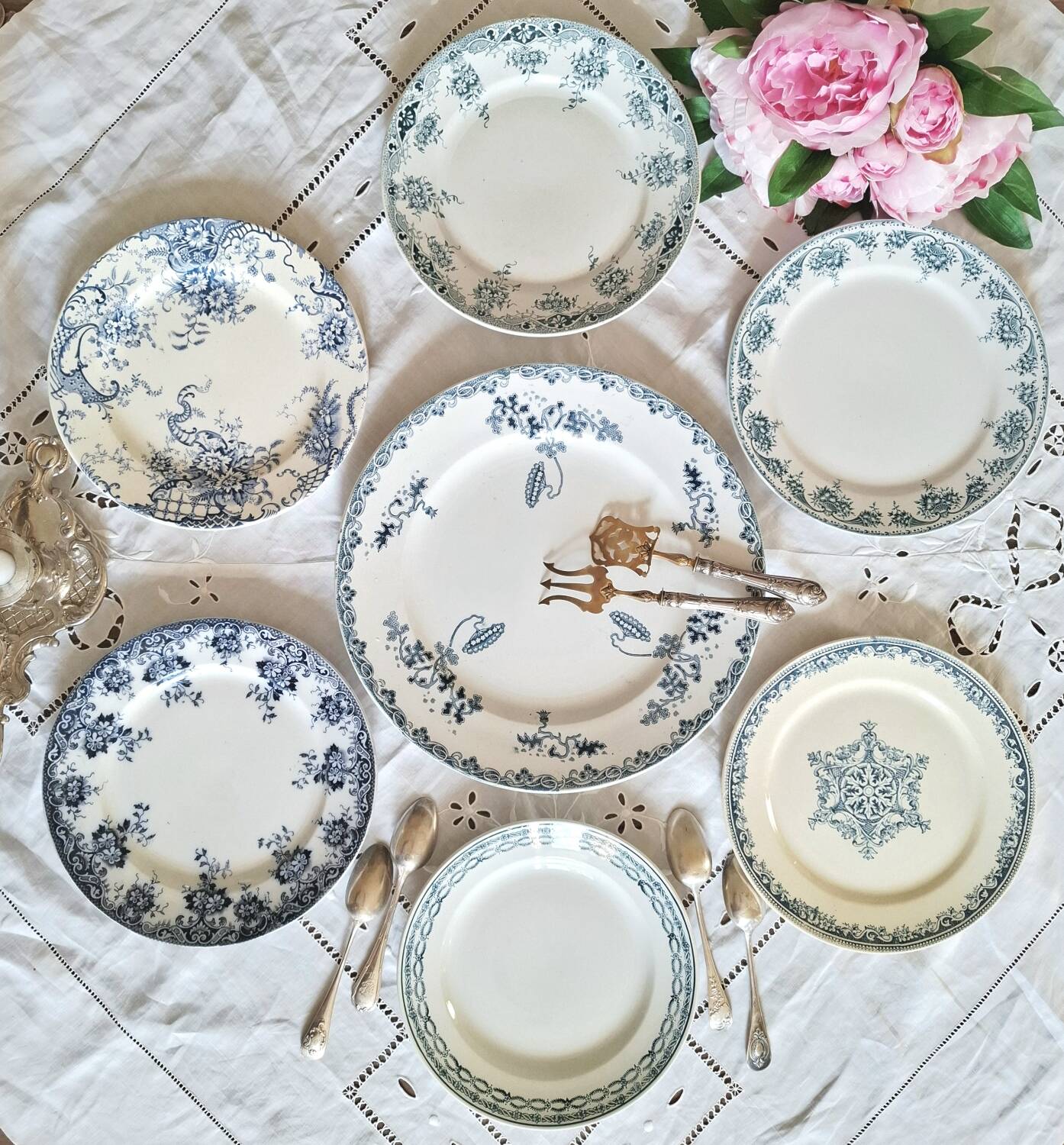 Antique earthenware dessert plates accompanied by a dish