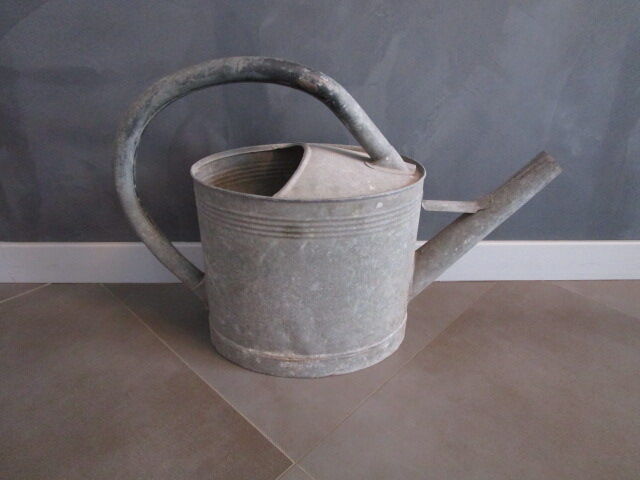 Old zinc watering can