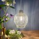 Suspension globe vintage en verre moulé transparent