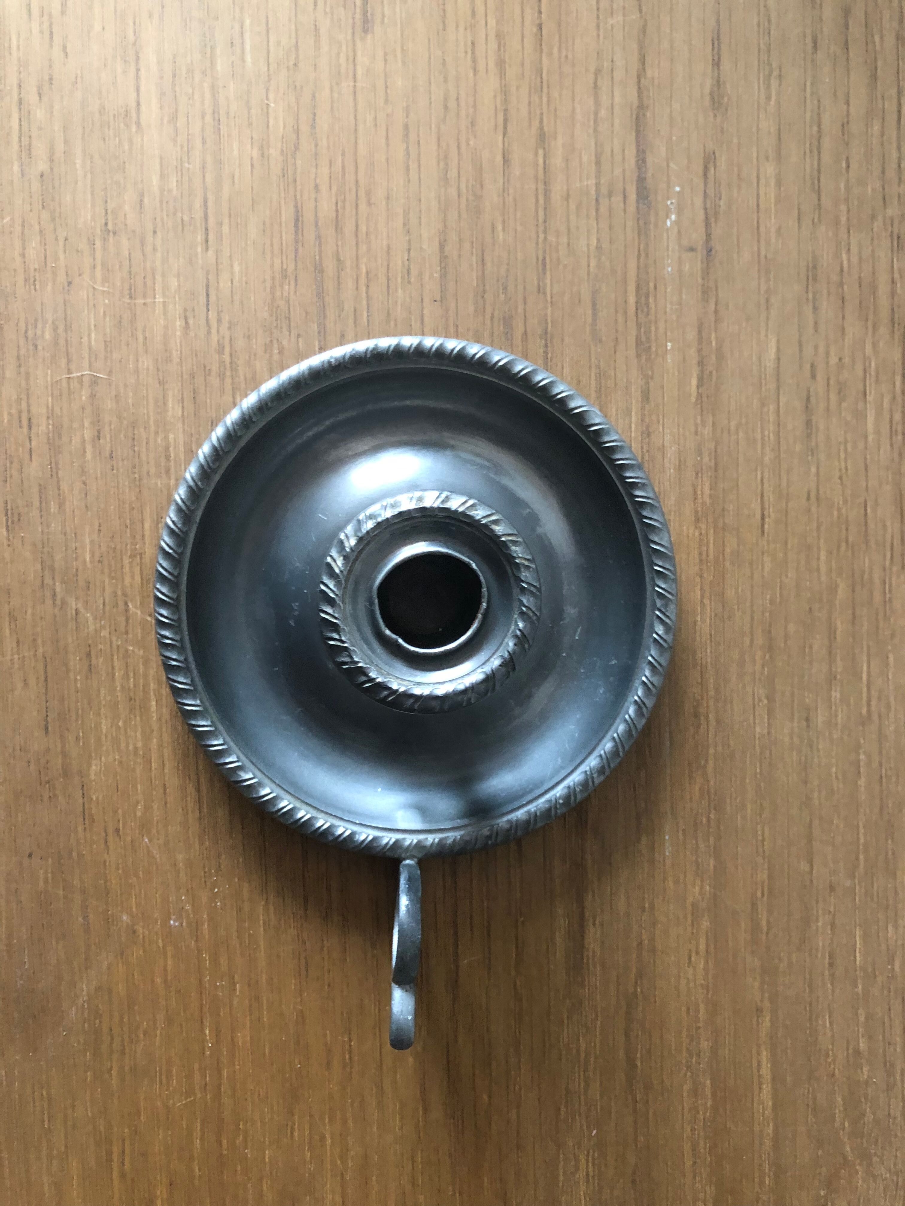 Tin hand candle holder