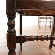 Pair of English oak armchairs with ladder back and rush seats