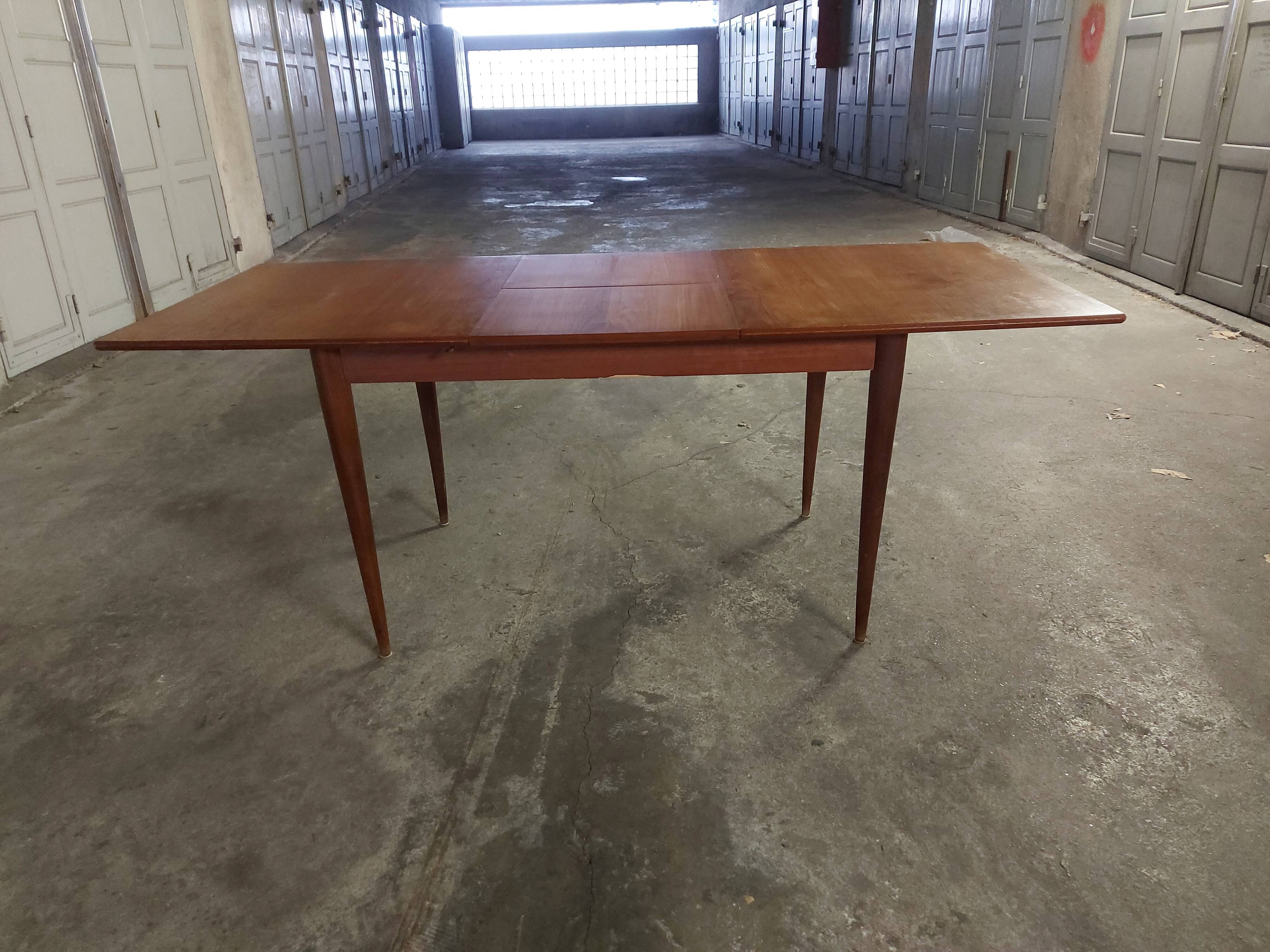 Scandinavian teak table with built-in extension