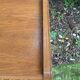 Vintage rattan chest of drawers with splayed legs from the 1950s.