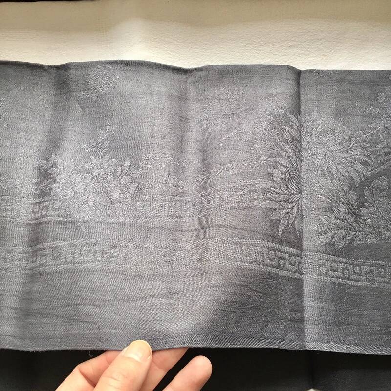 Old embroidered table napkin MA dark grey