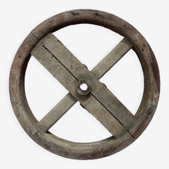 Antique wooden wheel, industrial wooden pulley