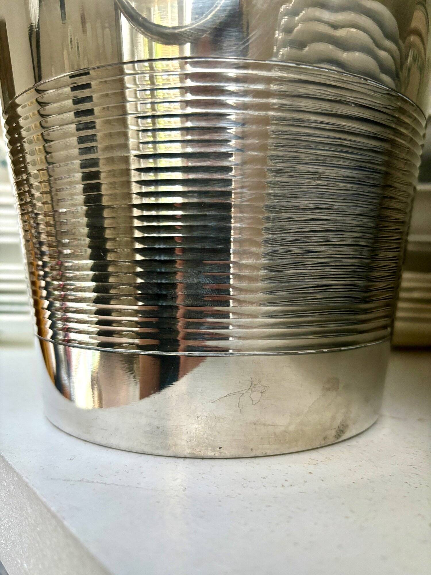 Silver metal champagne bucket