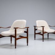 Pair of “Tiki” lounge chairs in teak and bouclé Busnelli Italy 1960