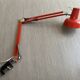 Vintage orange articulated desk lamp