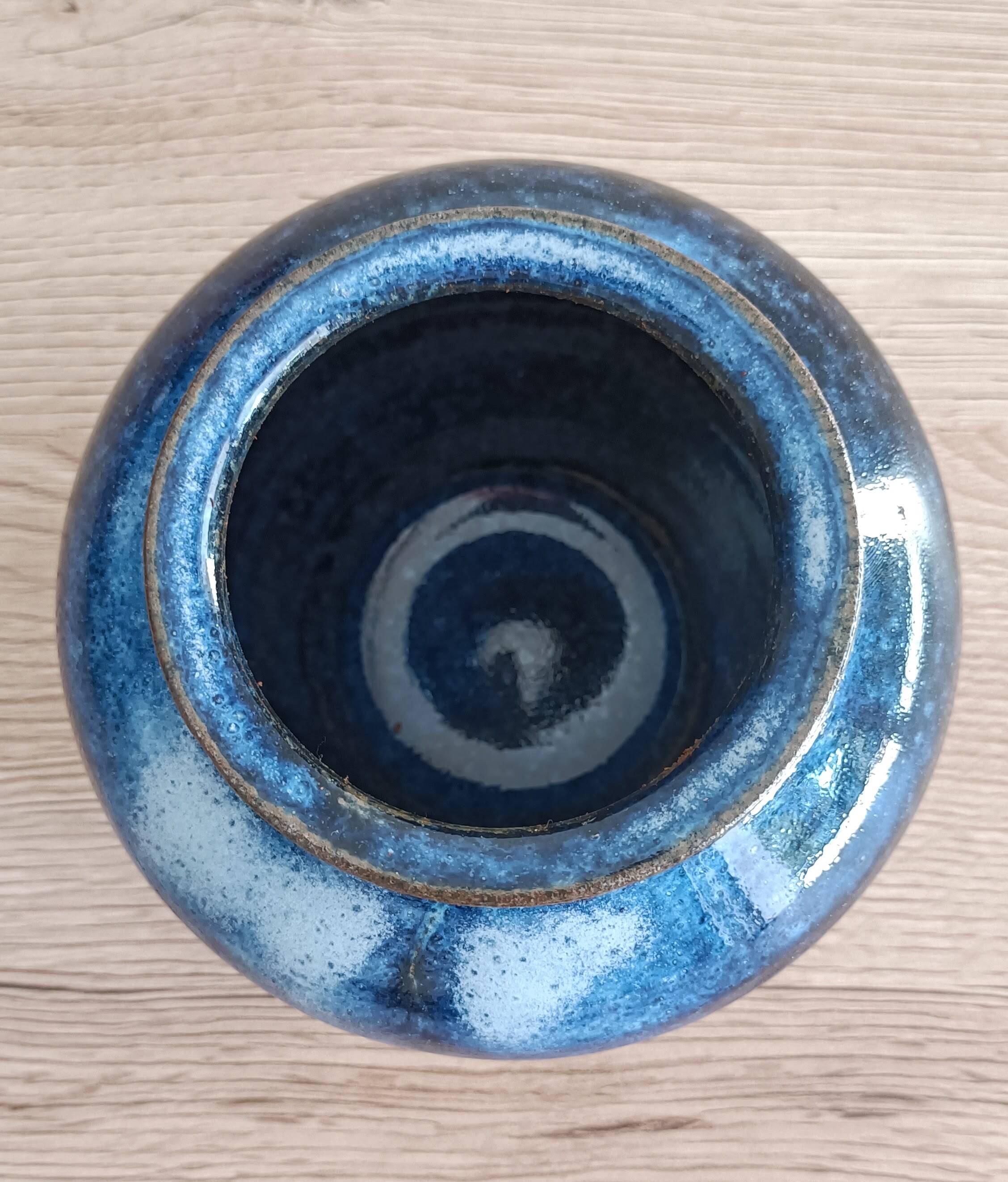 Blue glazed stoneware pot with cork stopper