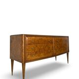 Veneered burl walnut chest of drawers with light warm brown glass top