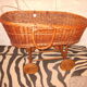 Rattan cradle on wheels