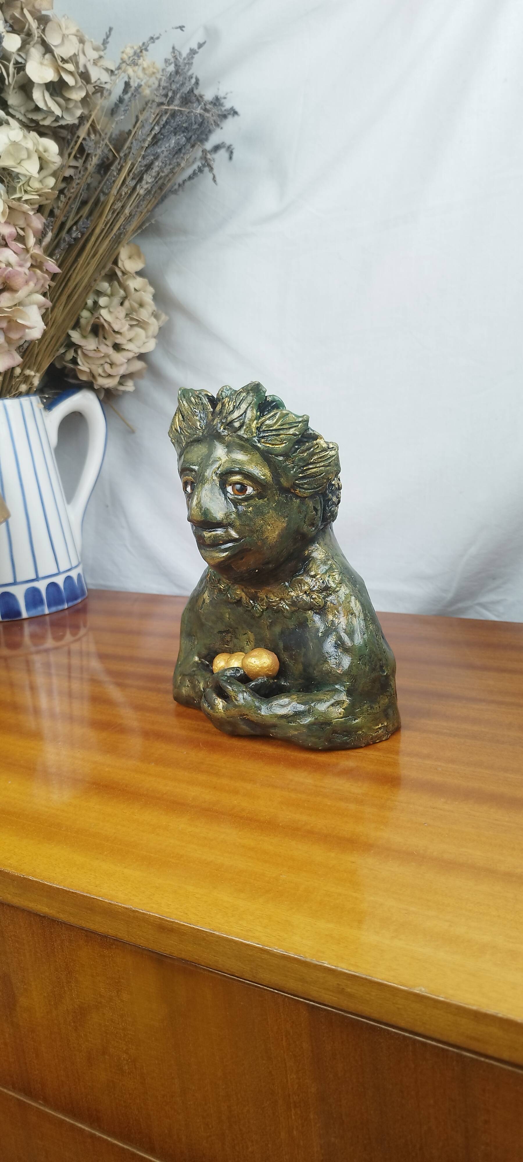 Clay sculpture of mother nature holding eggs, vintage modern figurative art