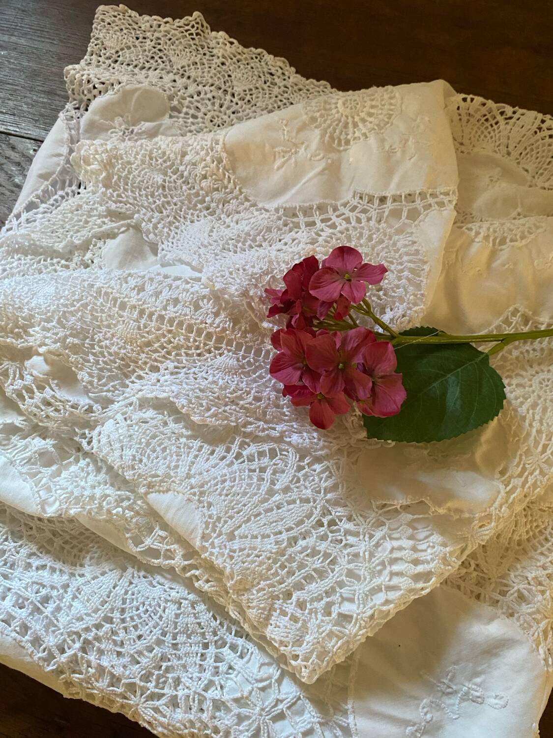 White cotton tablecloth with crochet lace.