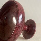 Bougeoirs et coupe en céramique mouchetée .