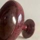 Candlesticks and bowl in speckled ceramic.