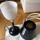 Miss K table lamp edited by Flos, designed by Philippe Starck in
