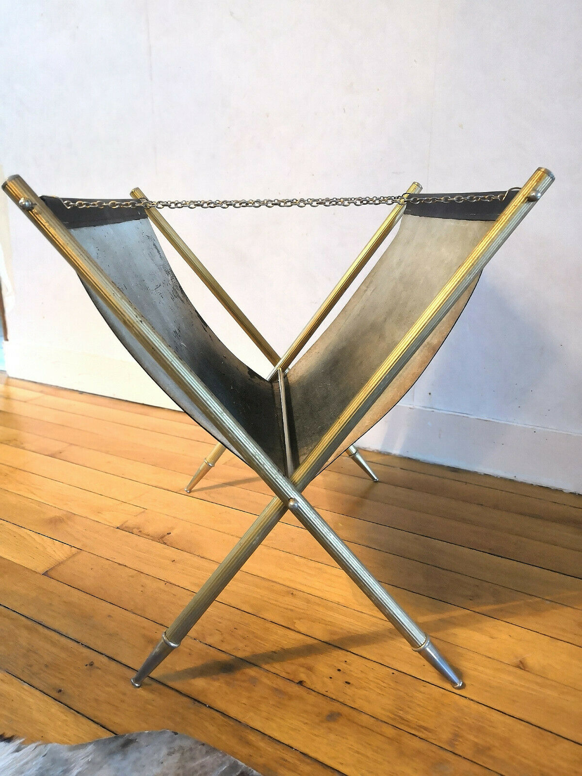 Wearing leather and brass magazines rack