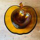 Salad bowl and apple raviers in amber glass 70 years