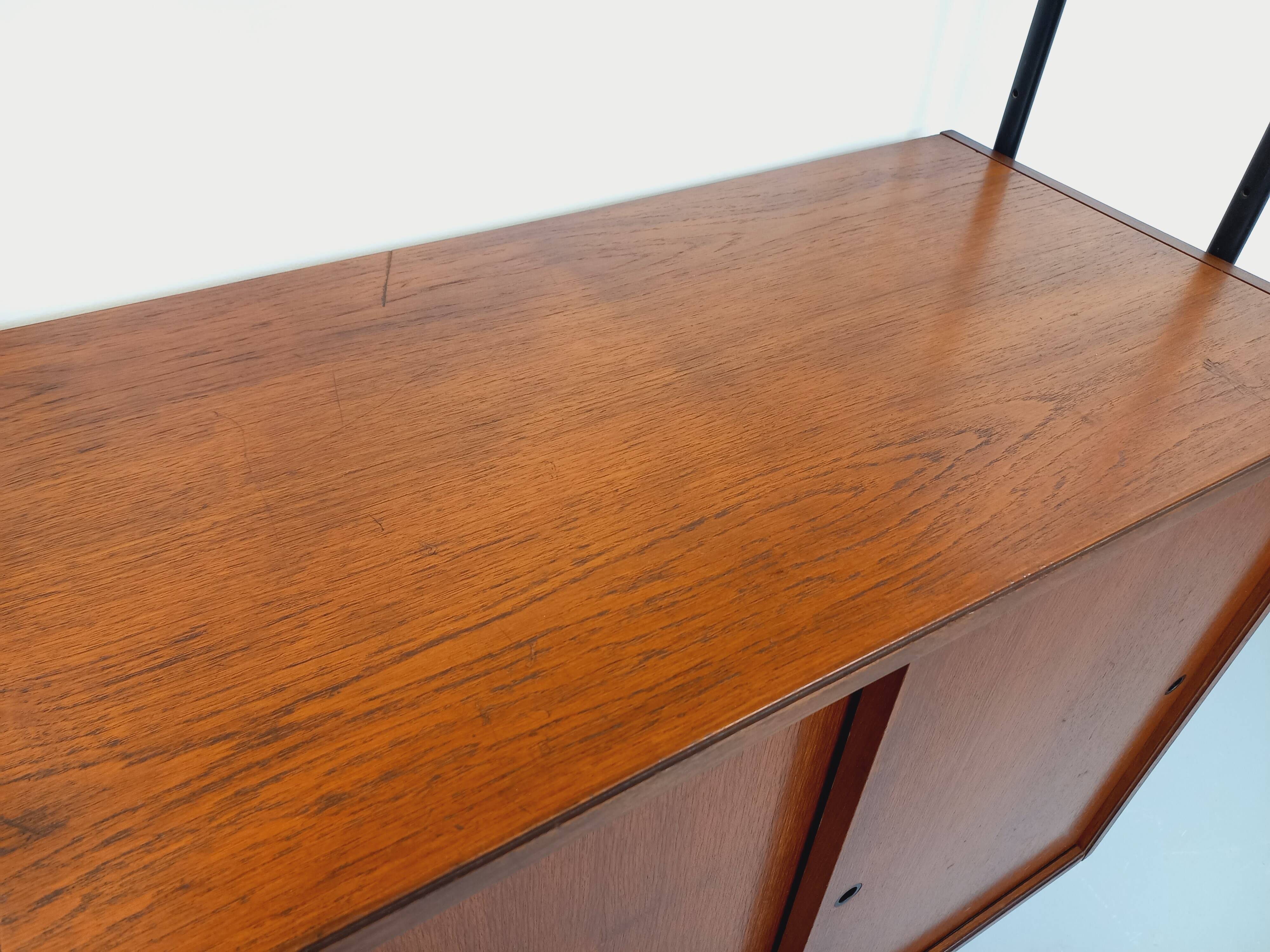 Vintage Italian modular shelving unit in teak and metal from the 1970s