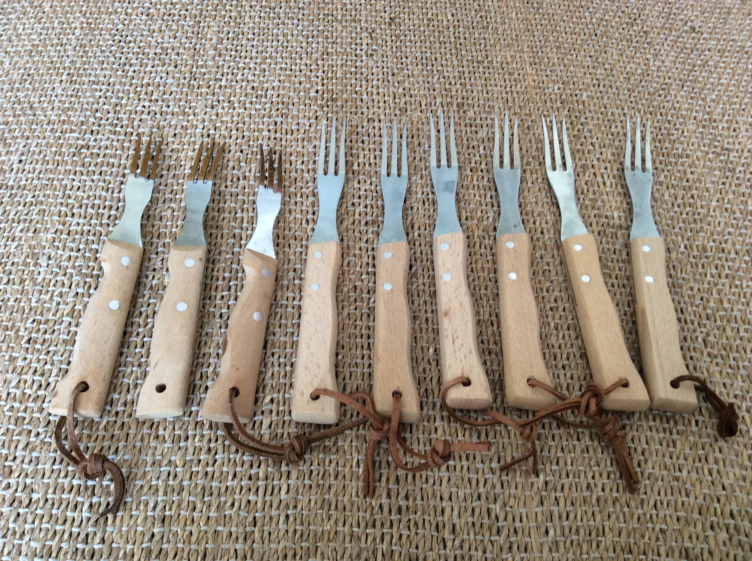 9 wood and metal forks
