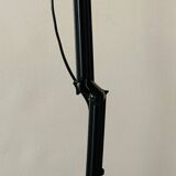 Old articulated desk lamp in red metal