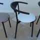 6 gondola-style chairs with a metal structure for indoor and outdoor use.