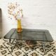 Table basse chromée et verre fumé