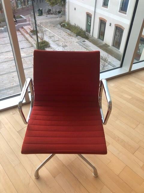 7 armchairs, 1 Charles & Ray Eames chair