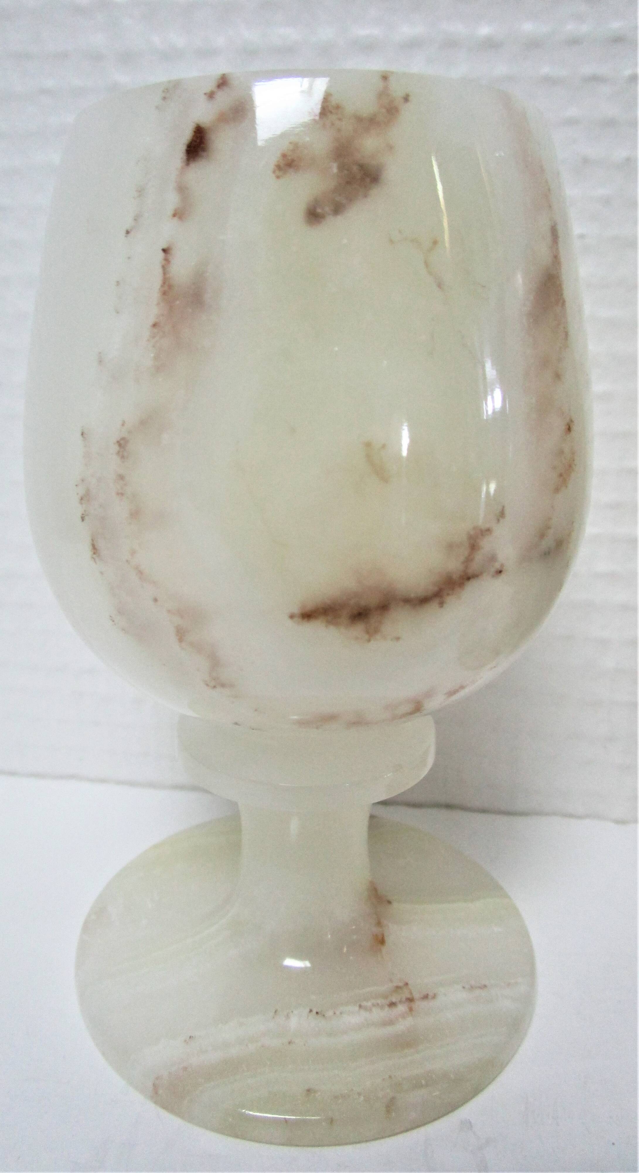 Three onyx candlesticks from the 70s