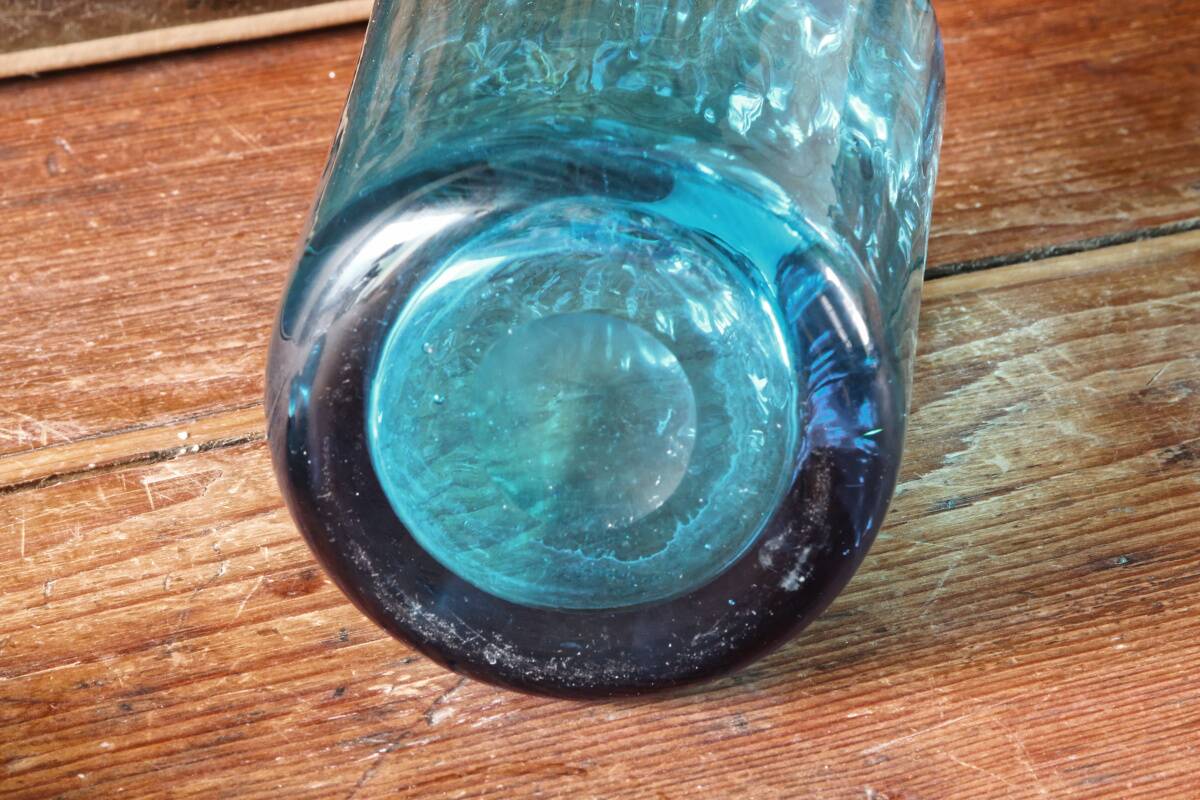 Large blown crystal bottle, twisted, turquoise blue, early 20th century.