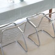 Lot of 2 chrome metal chairs by Gastone Rinaldi.