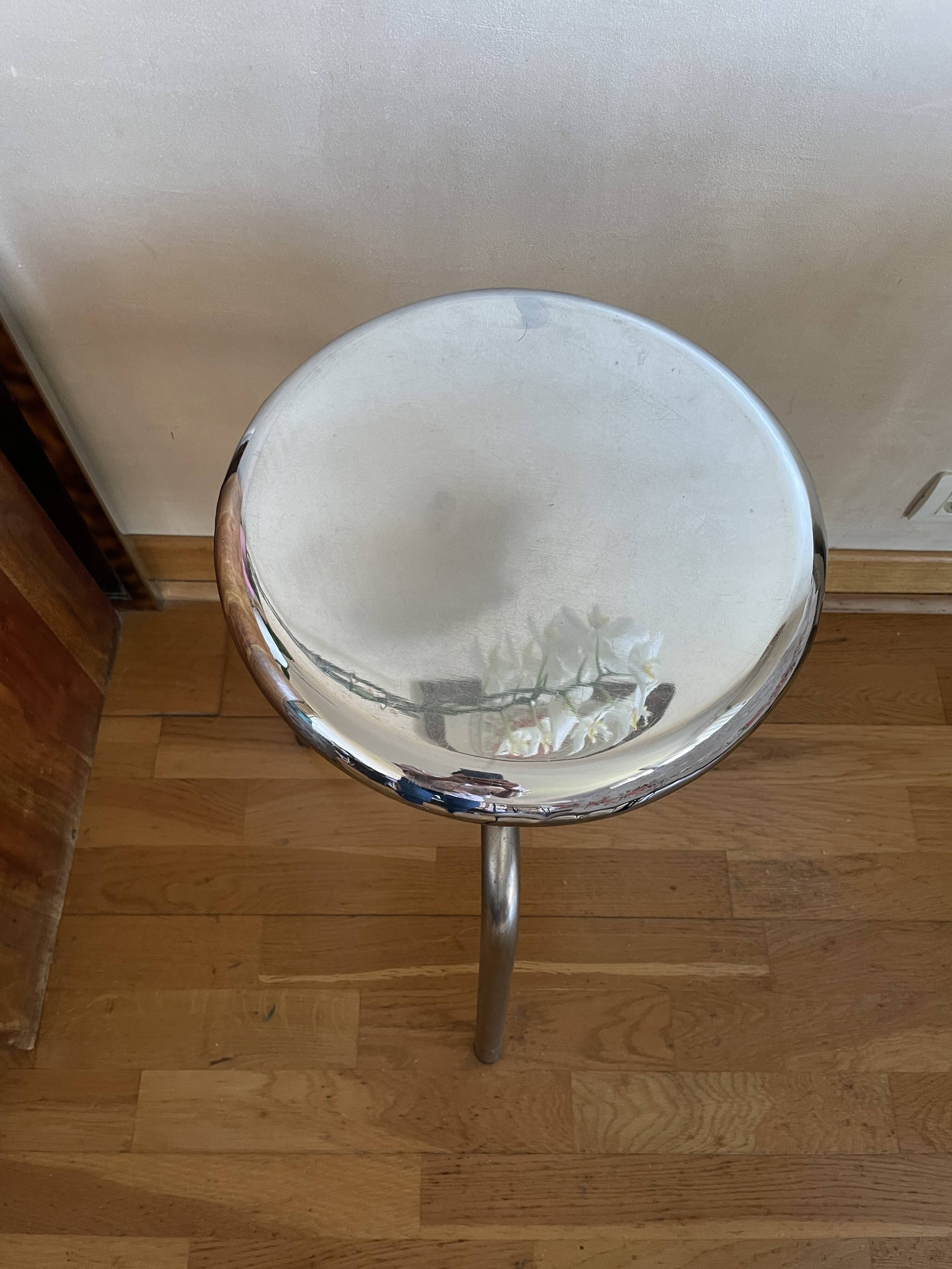 Chrome screw stool of hairdresser workshop