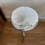 Chrome screw stool of hairdresser workshop