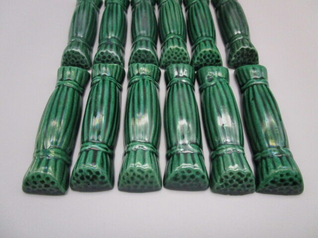 12 vintage ceramic knife holders