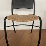 Set of 8 chairs in black lacquered metal and straw seats