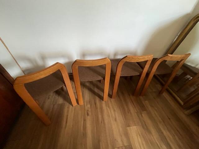 4 brown chairs