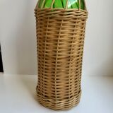 bottle surrounded by rattan 70s