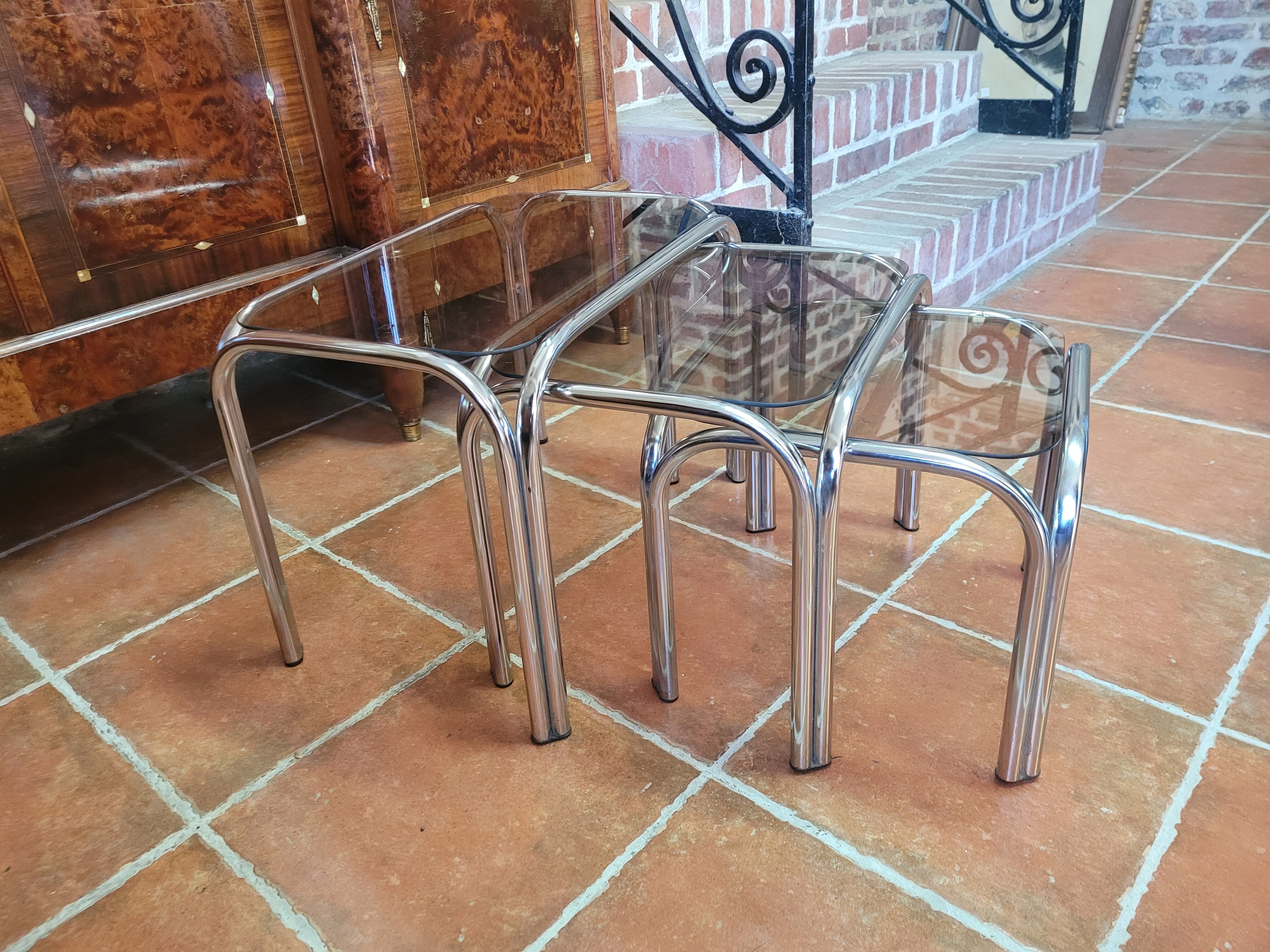 Chrome nesting table with smoked glass top from the 70s